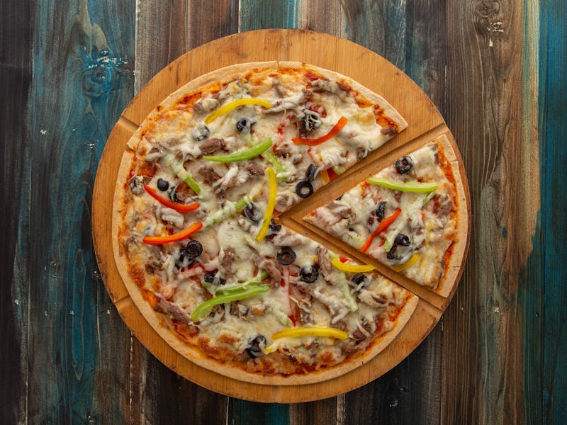 Fresh veggie via 313 pizza loaded with seasonal vegetables and melted cheese